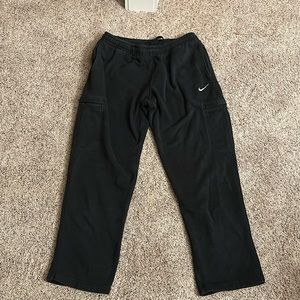 Men’s black Nike open bottom sweatpants, 2 pockets on each side